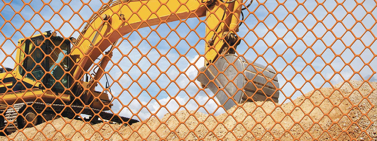 barrier fence with diamond mesh on construction site